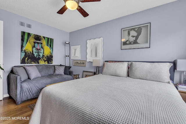 707 Cambridge Rd, Lanoka Harbor, NJ 08734 - bedroom with wood finished floors and ceiling fan