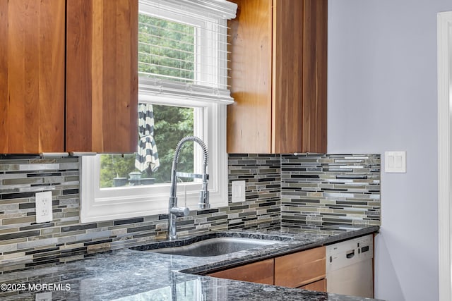 707 Cambridge Rd, Lanoka Harbor, NJ 08734 - kitchen with dishwasher, dark stone countertops, backsplash, and brown cabinets