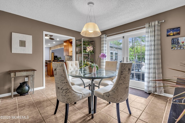 707 Cambridge Rd, Lanoka Harbor, NJ 08734 - dining area featuring light tile patterned floors and a textured ceiling