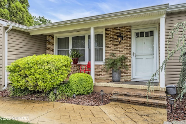 707 Cambridge Rd, Lanoka Harbor, NJ 08734 - entrance to property with brick siding