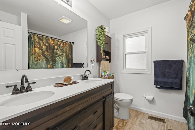 908 S Concourse, Keyport, NJ 07735 - full bathroom featuring double vanity, marble look tile flooring, and a shower with curtain