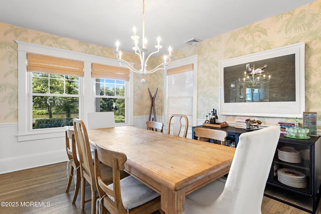 312 Lake Dr, Allenhurst, NJ 07711 - dining room with wallpapered walls, a chandelier, hardwood / wood-style floors, and a wainscoted wall