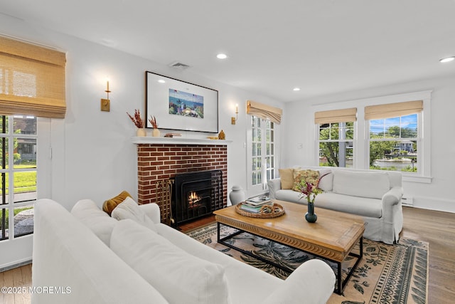 312 Lake Dr, Allenhurst, NJ 07711 - living room with wood finished floors, recessed lighting, and a fireplace