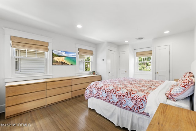312 Lake Dr, Allenhurst, NJ 07711 - bedroom featuring multiple windows, recessed lighting, and wood-type flooring