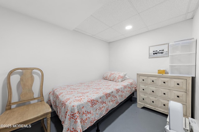 312 Lake Dr, Allenhurst, NJ 07711 - bedroom featuring a paneled ceiling, finished concrete flooring, and recessed lighting
