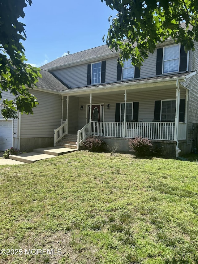 16 Aarons Way, Brick, NJ 08723 - view of front of house with a porch, a front yard, and a garage