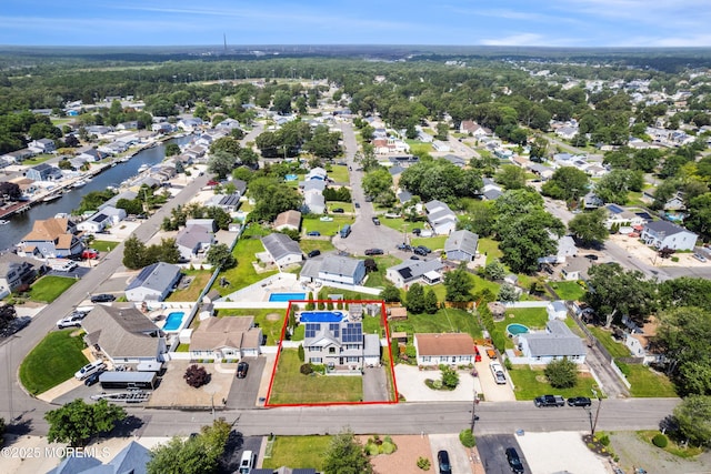 1020 Sarasota Dr, Forked River, NJ 08731 - aerial view of residential area featuring property parcel outlined and a nearby body of water
