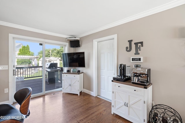 1020 Sarasota Dr, Forked River, NJ 08731 - living area with crown molding, wood finished floors, and a desk