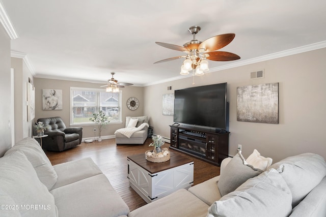 1020 Sarasota Dr, Forked River, NJ 08731 - living room featuring a ceiling fan, crown molding, wood finished floors, and a baseboard heating unit