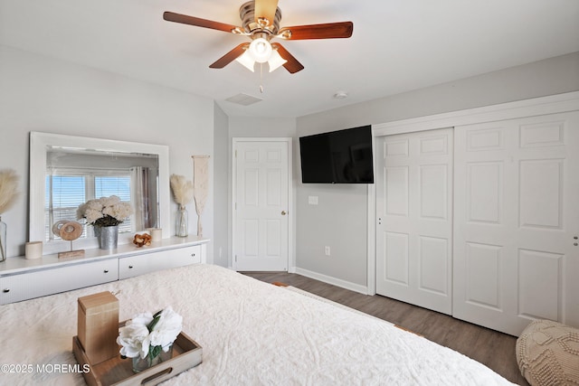 1020 Sarasota Dr, Forked River, NJ 08731 - bedroom with wood finished floors, a closet, and a ceiling fan