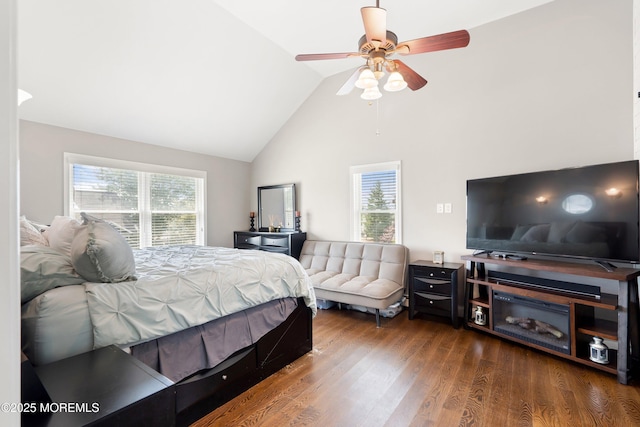 1020 Sarasota Dr, Forked River, NJ 08731 - bedroom featuring multiple windows, high vaulted ceiling, wood finished floors, and a ceiling fan