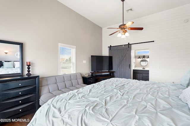 1020 Sarasota Dr, Forked River, NJ 08731 - bedroom with high vaulted ceiling, a barn door, ensuite bathroom, and ceiling fan
