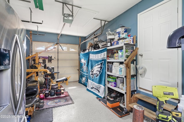 1020 Sarasota Dr, Forked River, NJ 08731 - garage featuring stainless steel fridge and a garage door opener