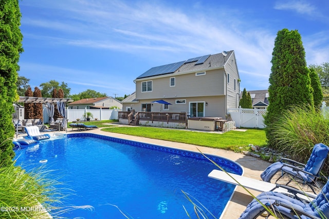 1020 Sarasota Dr, Forked River, NJ 08731 - view of swimming pool with a deck, a hot tub, a fenced backyard, a pergola, and a gate