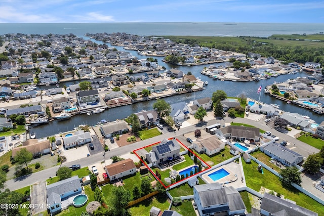 1020 Sarasota Dr, Forked River, NJ 08731 - aerial perspective of suburban area featuring property boundaries highlighted and a large body of water
