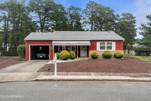 13 Millbrook Ct, Toms River, NJ 08757 - bungalow-style house featuring a garage and driveway