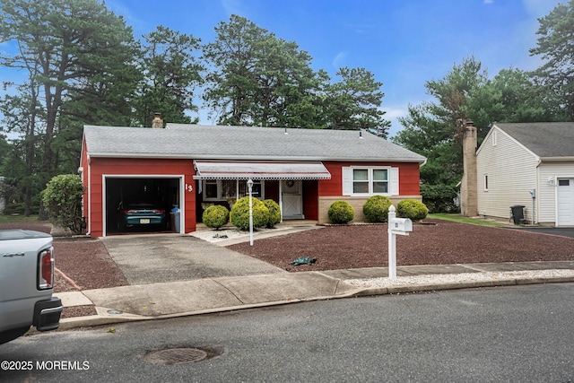13 Millbrook Ct, Toms River, NJ 08757 - view of front of home with an attached garage, driveway, a chimney, and roof with shingles