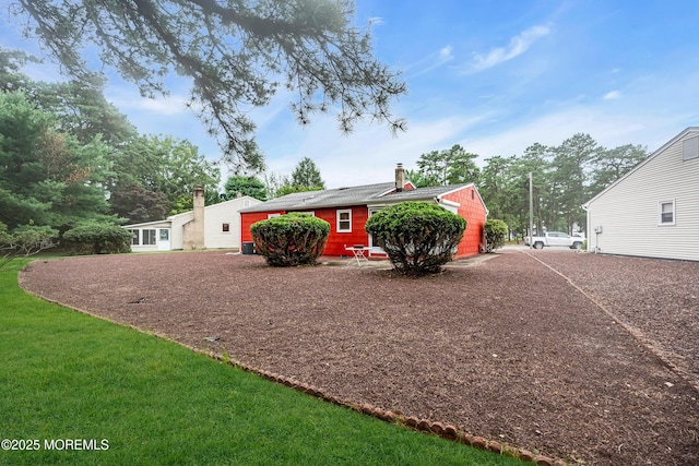 13 Millbrook Ct, Toms River, NJ 08757 - view of home's exterior featuring a chimney
