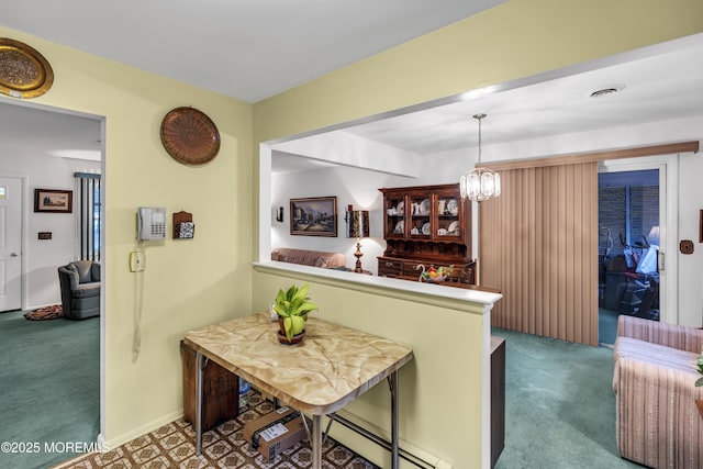 13 Millbrook Ct, Toms River, NJ 08757 - kitchen featuring carpet flooring, a baseboard radiator, a chandelier, and hanging light fixtures
