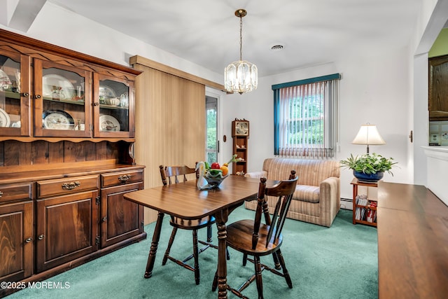 13 Millbrook Ct, Toms River, NJ 08757 - dining area featuring carpet flooring, a chandelier, and a baseboard radiator