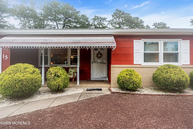 13 Millbrook Ct, Toms River, NJ 08757 - property entrance featuring brick siding
