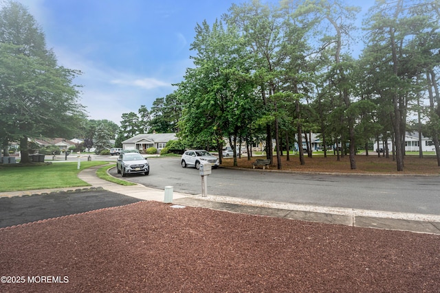 13 Millbrook Ct, Toms River, NJ 08757 - view of asphalt street featuring curbs