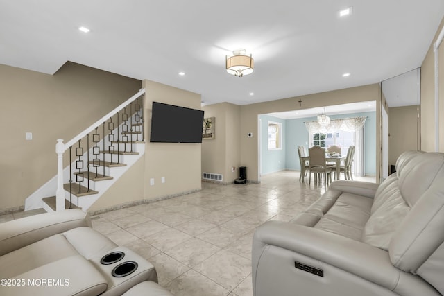 64 Scarlet Dr, Parlin, NJ 08859 - living room featuring stairs, recessed lighting, and a chandelier