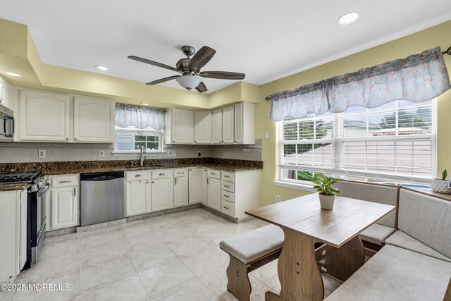 64 Scarlet Dr, Parlin, NJ 08859 - kitchen featuring stainless steel appliances, tasteful backsplash, ceiling fan, white cabinets, and recessed lighting