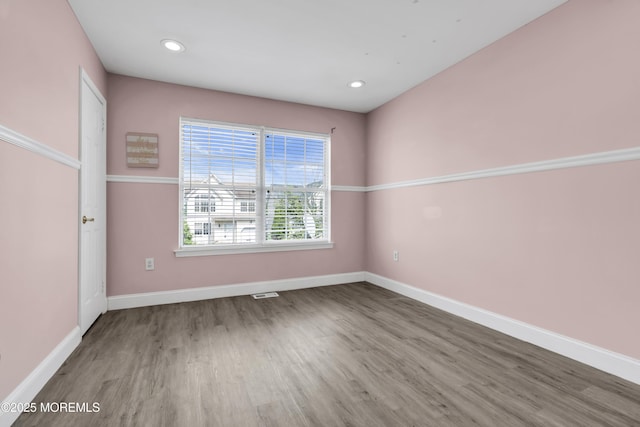 64 Scarlet Dr, Parlin, NJ 08859 - empty room featuring wood finished floors and recessed lighting