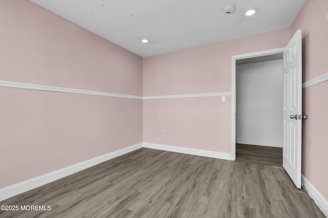 64 Scarlet Dr, Parlin, NJ 08859 - empty room featuring a smoke detector, wood finished floors, and recessed lighting