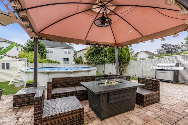 64 Scarlet Dr, Parlin, NJ 08859 - view of patio featuring a grill and an outdoor living space with a fire pit