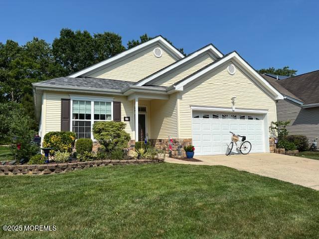 17 Marigold Ln, Little Egg Harbor, NJ 08087 - ranch-style house featuring a garage, driveway, and a front yard