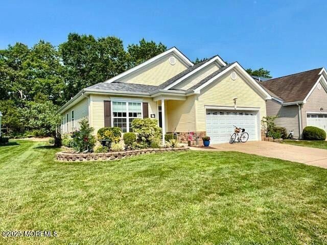 17 Marigold Ln, Little Egg Harbor, NJ 08087 - ranch-style home with a garage, concrete driveway, and a front lawn