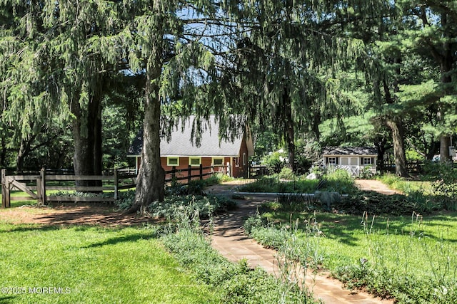 147 Montrose Rd, Colts Neck, NJ 07722 - view of yard featuring a storage unit