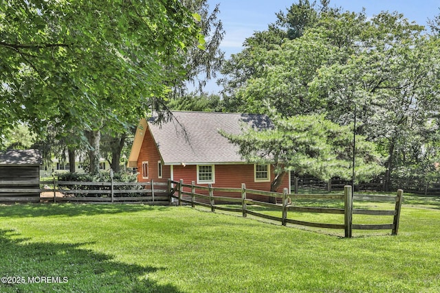 147 Montrose Rd, Colts Neck, NJ 07722 - view of front of home with a fenced backyard and roof with shingles
