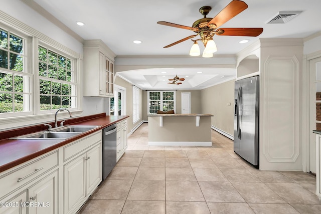 147 Montrose Rd, Colts Neck, NJ 07722 - kitchen featuring stainless steel appliances, ceiling fan, dark countertops, crown molding, and recessed lighting