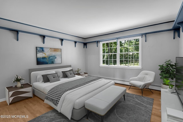 147 Montrose Rd, Colts Neck, NJ 07722 - bedroom with light wood-style flooring and a baseboard radiator