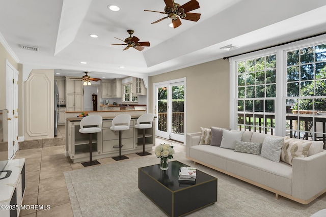147 Montrose Rd, Colts Neck, NJ 07722 - living area featuring plenty of natural light, ceiling fan, recessed lighting, light tile patterned floors, and a raised ceiling
