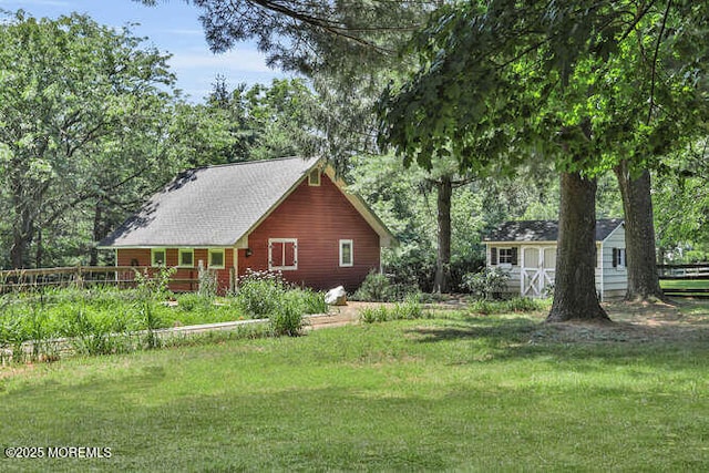 147 Montrose Rd, Colts Neck, NJ 07722 - view of home's exterior featuring a storage shed