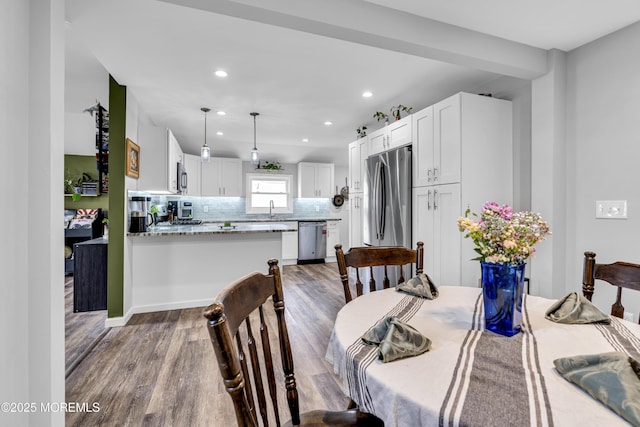 208 Hilltop Blvd, Cliffwood, NJ 07735 - dining space featuring wood finished floors and recessed lighting