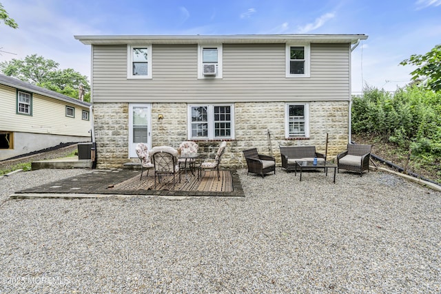 208 Hilltop Blvd, Cliffwood, NJ 07735 - back of property featuring outdoor lounge area, a deck, and stone siding