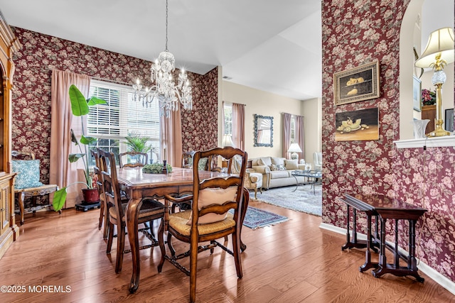 43 Bradley Beach Way, Waretown, NJ 08758 - dining space featuring wallpapered walls, healthy amount of natural light, hardwood / wood-style flooring, and a chandelier
