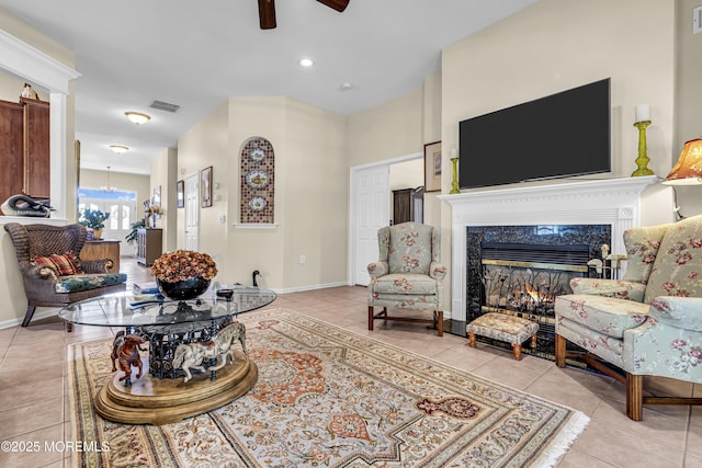 43 Bradley Beach Way, Waretown, NJ 08758 - living area with light tile patterned floors, a high end fireplace, and a ceiling fan