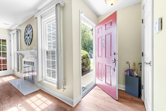 363 Yorkshire Pl, Morganville, NJ 07751 - entrance foyer with baseboards and light wood-style flooring