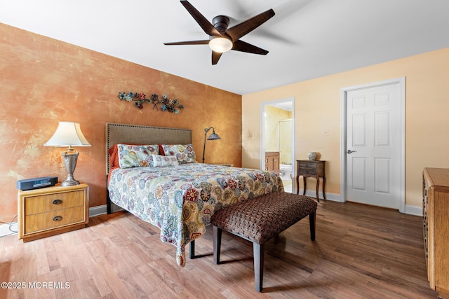 363 Yorkshire Pl, Morganville, NJ 07751 - bedroom with wood finished floors, a ceiling fan, and connected bathroom