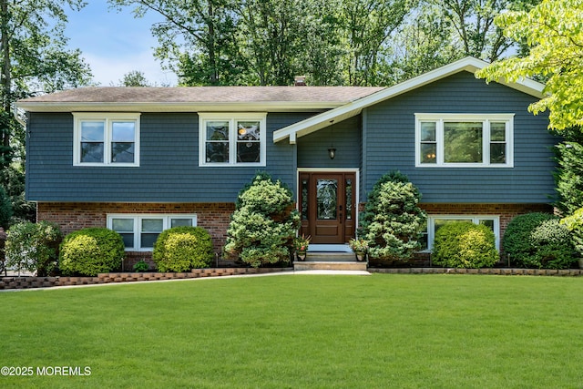 1617 Doris St, Wall, NJ 07719 - split foyer home featuring a front yard, brick siding, and entry steps