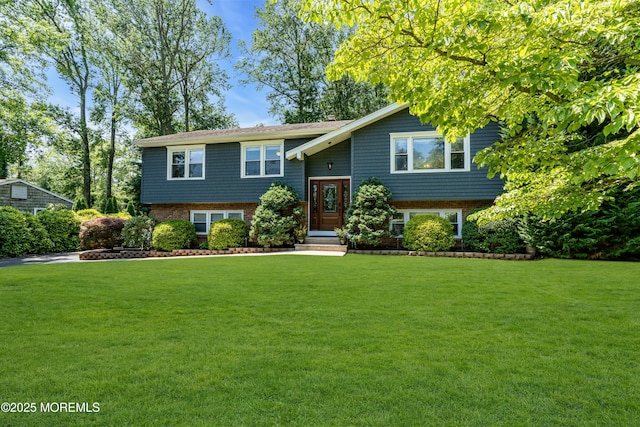 1617 Doris St, Wall, NJ 07719 - bi-level home with a front lawn and brick siding