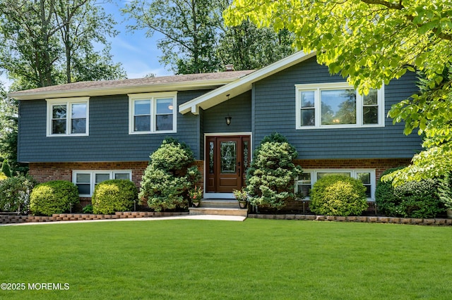 1617 Doris St, Wall, NJ 07719 - split foyer home featuring a front lawn and brick siding