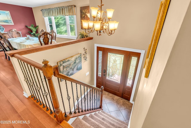 1617 Doris St, Wall, NJ 07719 - foyer entrance with a chandelier and stairs