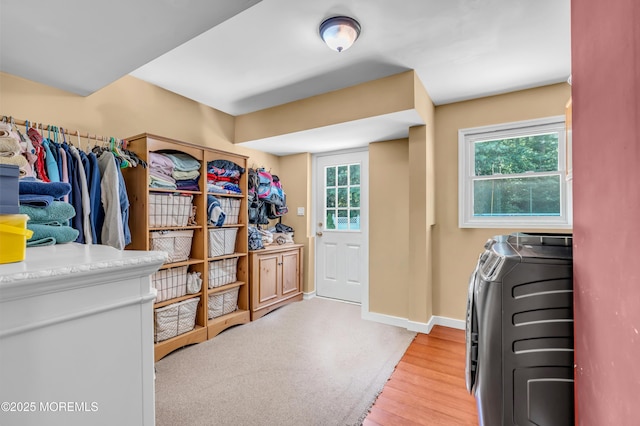 1617 Doris St, Wall, NJ 07719 - walk in closet with independent washer and dryer and light wood-type flooring